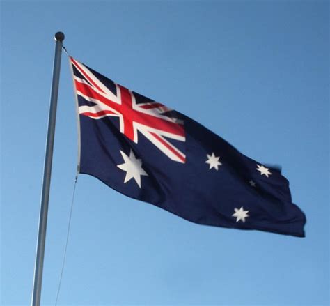 Convert PHP to AUD at the real exchange rate .